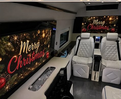 Inside the Social Luxury Sprinter with Merry Christmas on the cabin screens